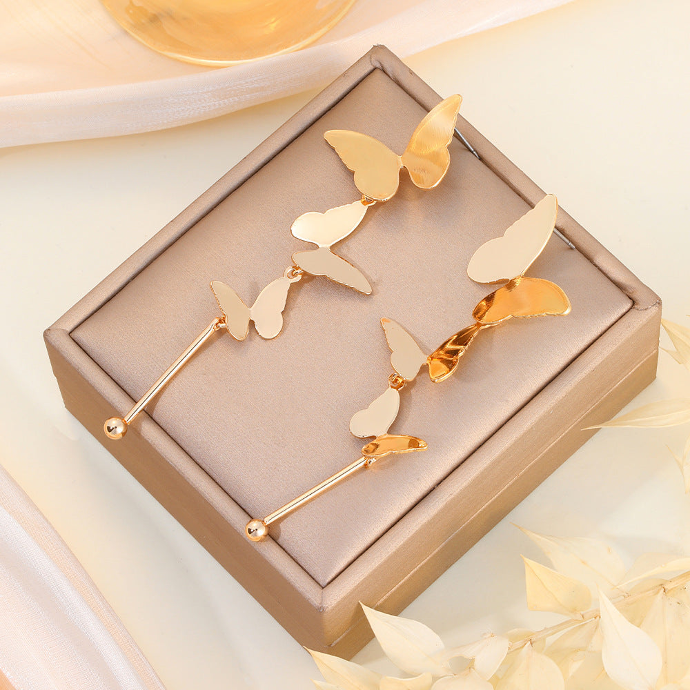Aretes Mariposas Escalonadas Doradas