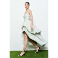 Vestido largo de jacquard floral con olanes y corte asimétrico