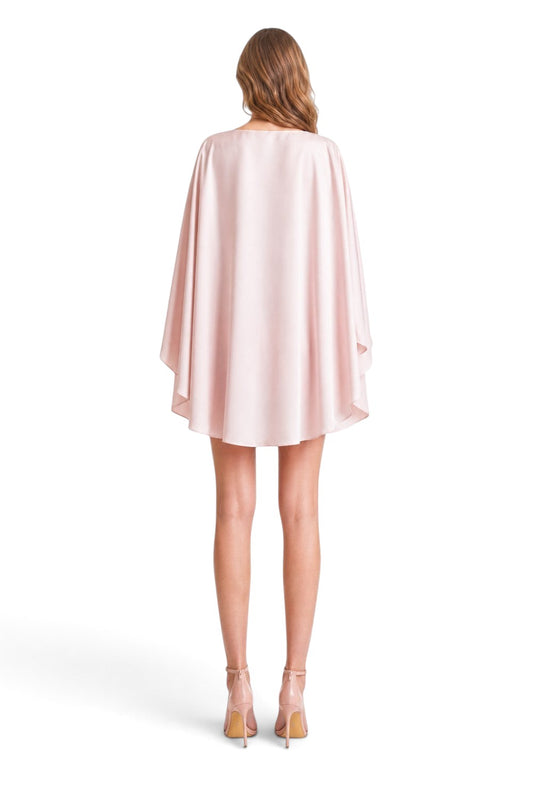 Pink shop by maf baby pink satin cape top worn by a model, back view showing dramatic drape and elegant silhouette