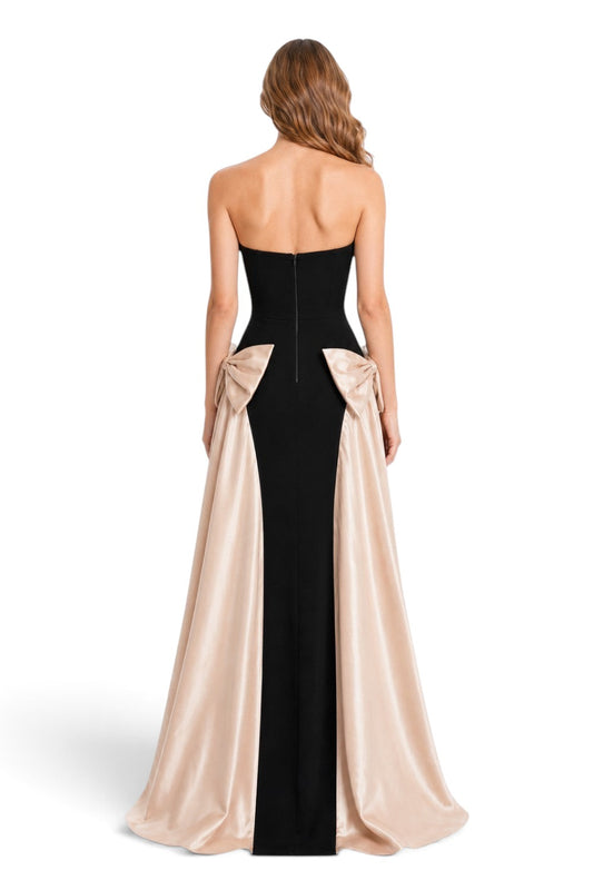 Pink shop by maf black strapless floor-length gown with champagne satin side bows and draped overskirt back view