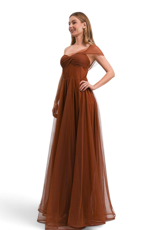 Pink shop by maf burnt orange one-shoulder maxi dress with tulle fabric and back tie detail worn by a model