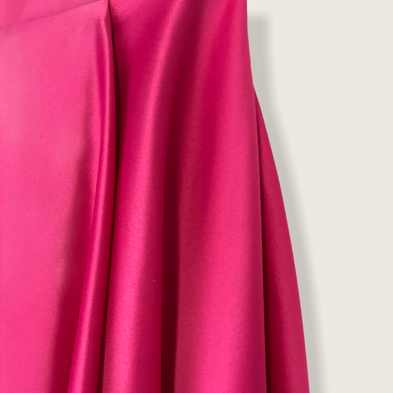 Falda Asimetrica fucsia