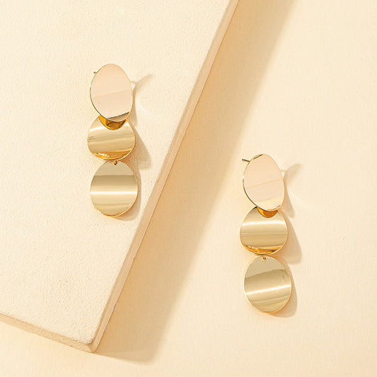 Aretes Cascada de Tres Discos Dorados