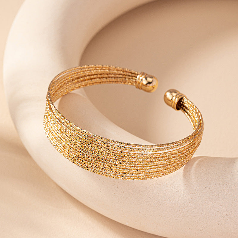 Brazalete Rígido Malla Dorada Texturizada