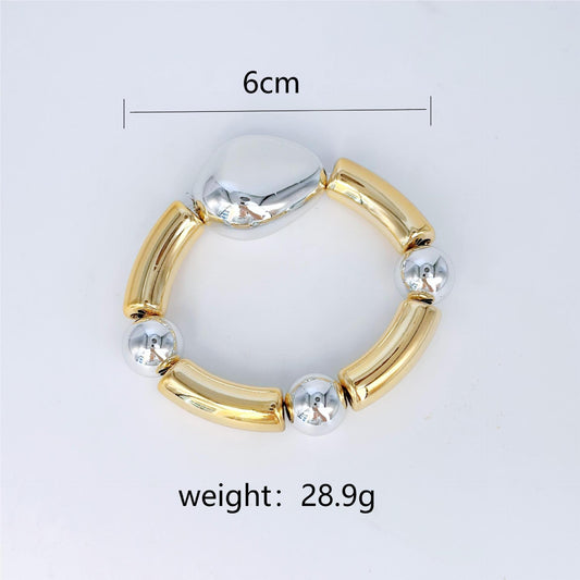 Pulsera Elástica Tubos Dorados y Esferas Plateadas