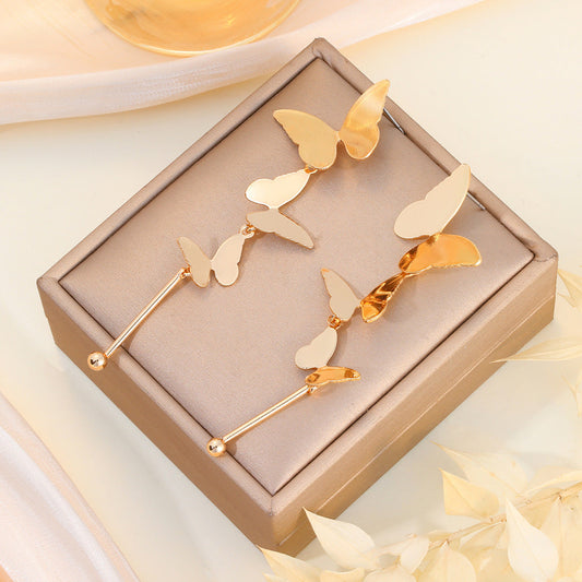 Aretes Mariposas Escalonadas Doradas