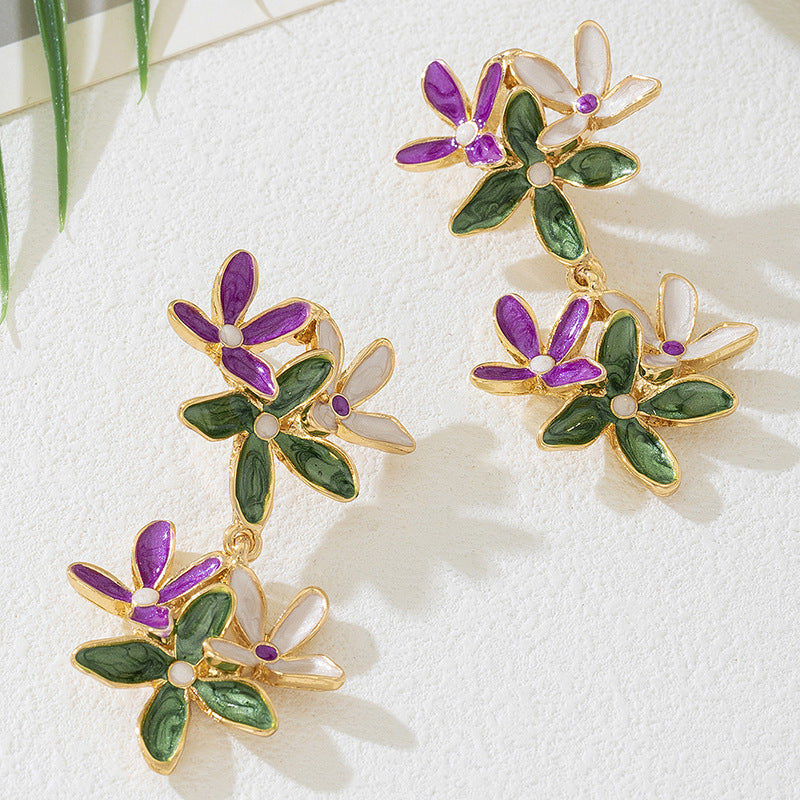 Aretes Flor Esmaltada Verde Morado y Blanco