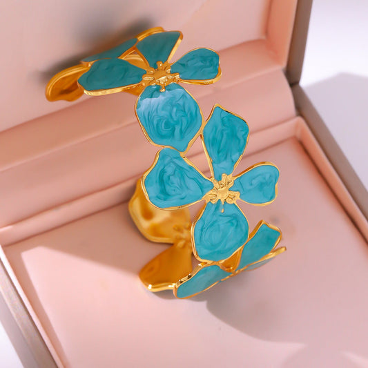Brazalete Rígido Flores Esmaltadas Turquesa Doradas