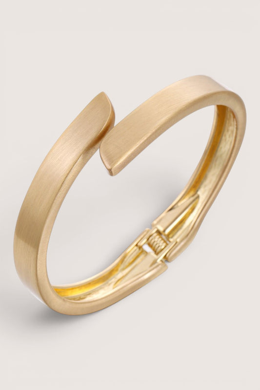 Brazalete Rígido Cruzado Dorado Mate