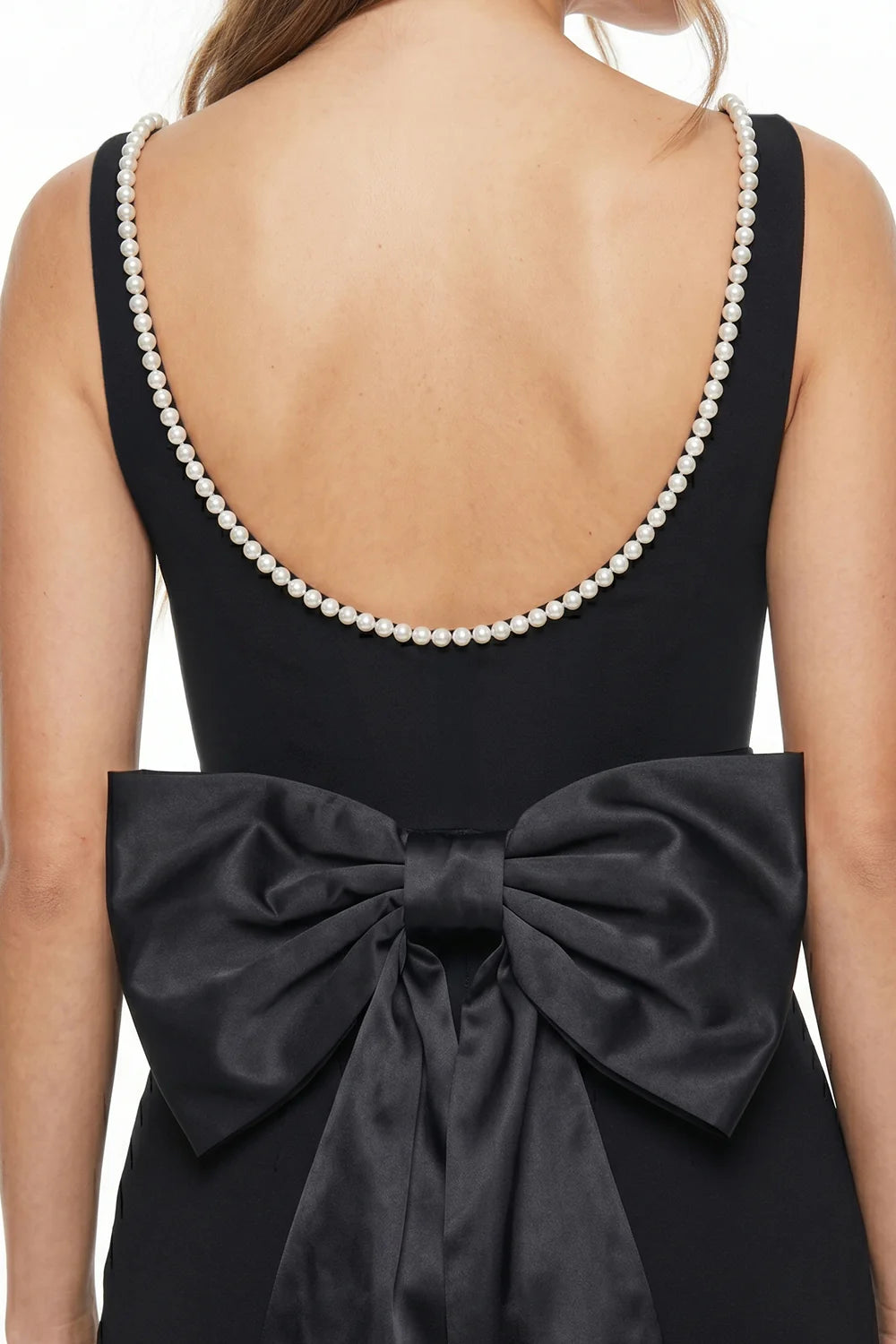 Vista posterior moño vestido negro sirena - Pink Shop by MAF