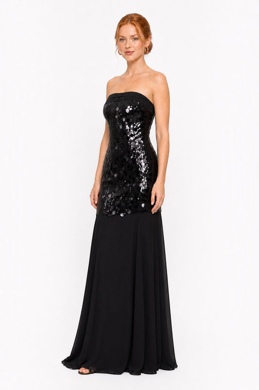 Pink shop by maf black strapless mermaid gown with sequin bodice and flowing chiffon skirt on a model