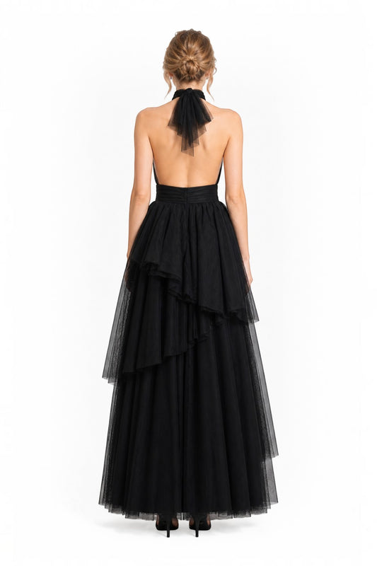 Pink shop by maf black tulle halter gown with a bow neck tie and asymmetric tiered skirt, back view