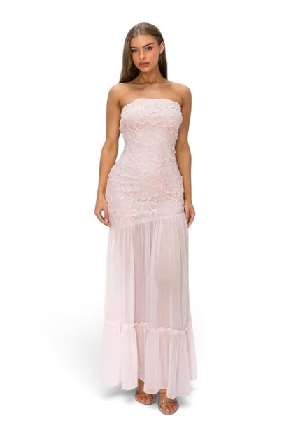 Model wearing a Pink shop by maf blush pink strapless midi dress with 3D floral lace bodice and sheer mesh skirt.