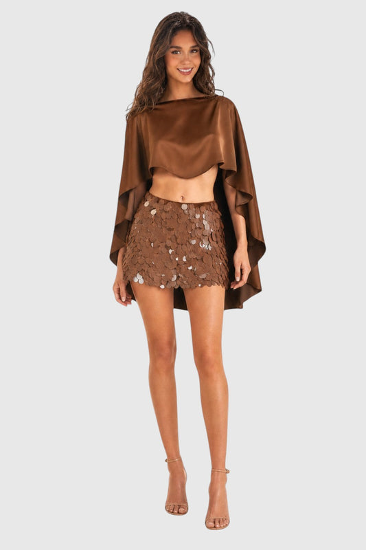 Pink shop by maf two-piece brown satin cape top and mini skirt with 3D floral sequin embellishments on a model