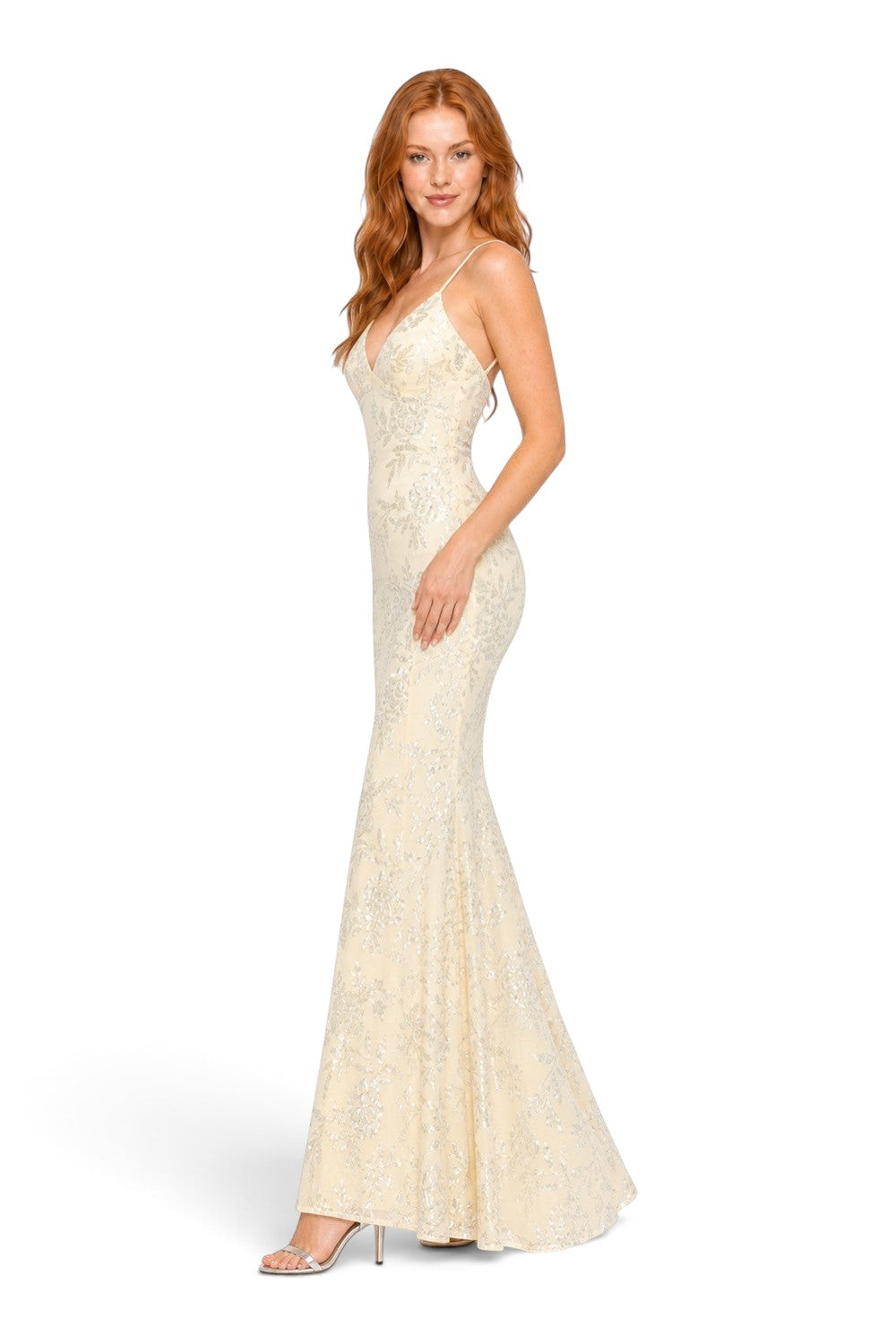 Pink shop by maf butter yellow floral sequin mermaid gown with thin straps on a model, side view.