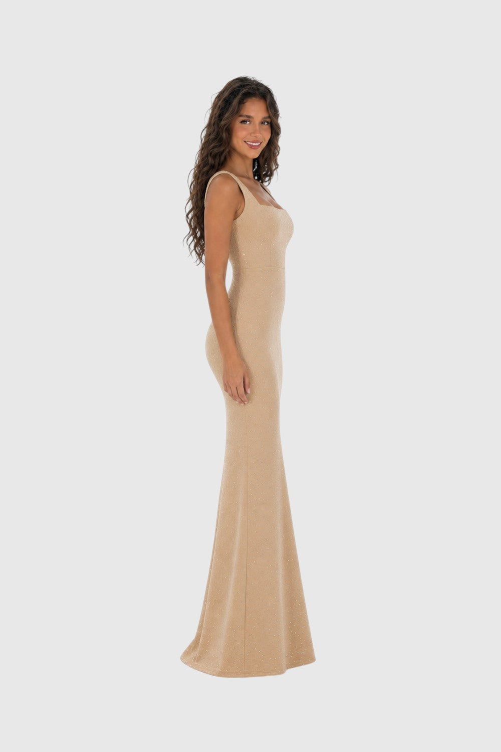 Model wearing a Pink shop by maf champagne floor-length mermaid dress with a square neckline and shimmering details.