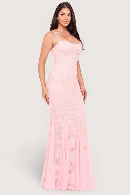 Model wearing a Pink shop by maf dusty pink mermaid maxi dress with 3D floral lace, spaghetti straps, and chiffon.