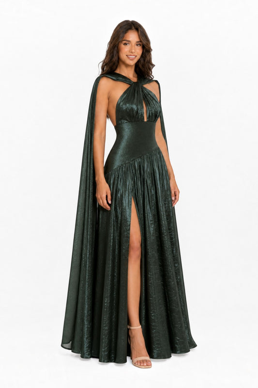 Pink shop by maf emerald green metallic halter gown with a flowing cape, cinched waist, and high leg slit.