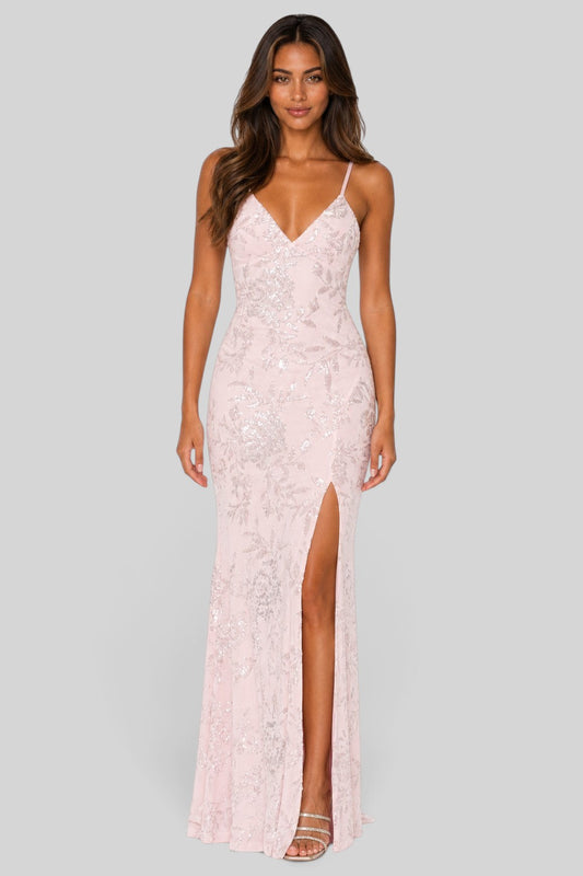 Pink shop by maf pink floral sequin mermaid gown with thin straps and a high leg slit worn by a model