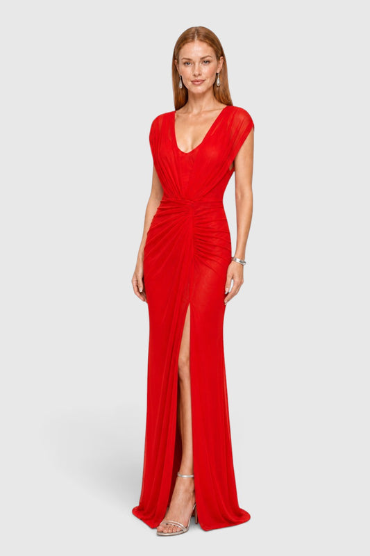 Pink shop by maf red mesh evening gown with draped shoulders, waist knot detail, and high leg slit on a model