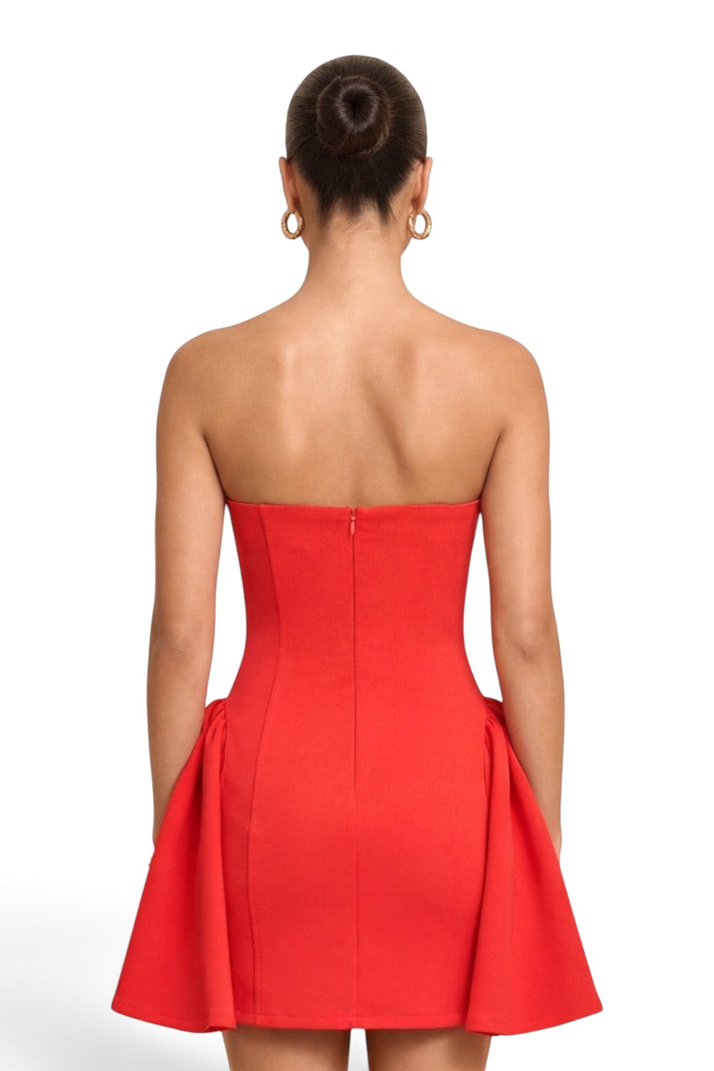 Back view of a Pink shop by maf red strapless mini dress with voluminous hip godets and a fitted silhouette.
