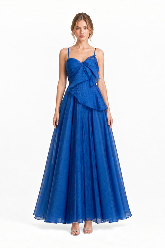 Pink shop by maf royal blue organza gala dress with thin straps, side bow detail, and a voluminous floor-length skirt.