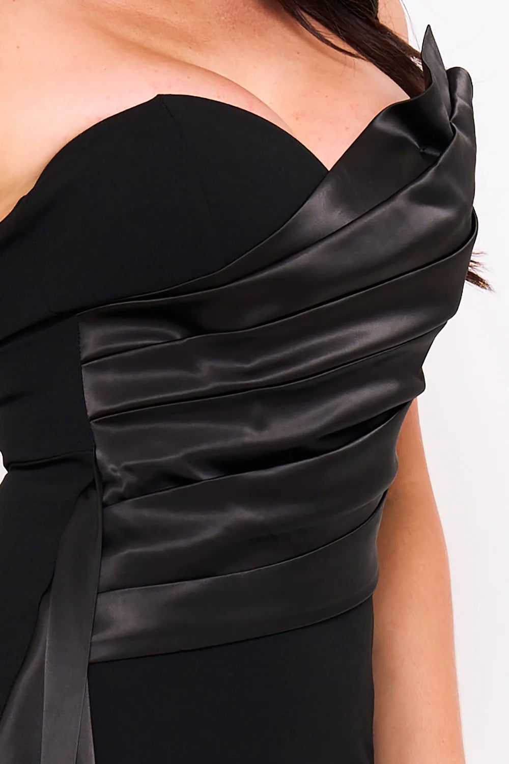 Close-up of the hand-draped black satin sweetheart bustier of the Pink shop by maf mermaid gown