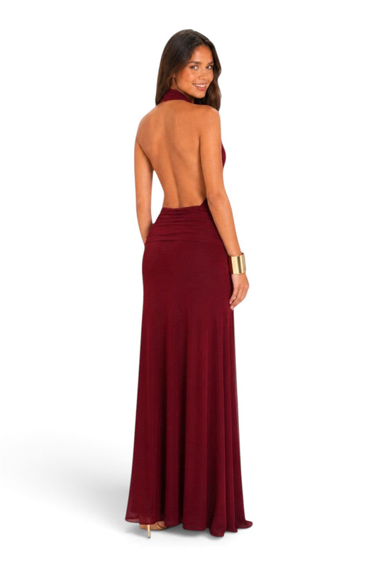 Pink shop by maf wine red maxi dress with halter neck, open back, and side mesh panels on a smiling model