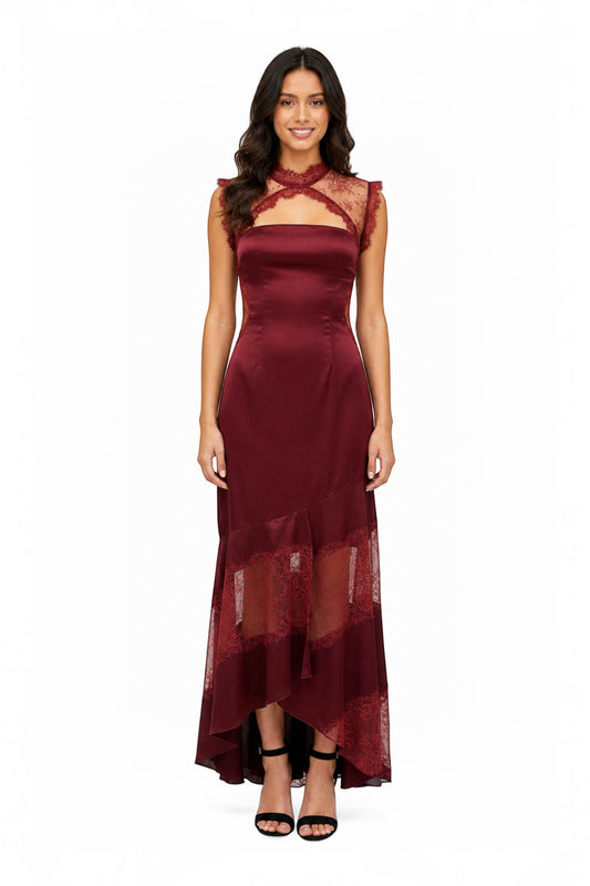 Pink shop by maf wine satin maxi dress with lace panels, high neck, and asymmetrical ruffled hem on a model